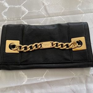 Michael Kohrs Black Clutch Gold Chain